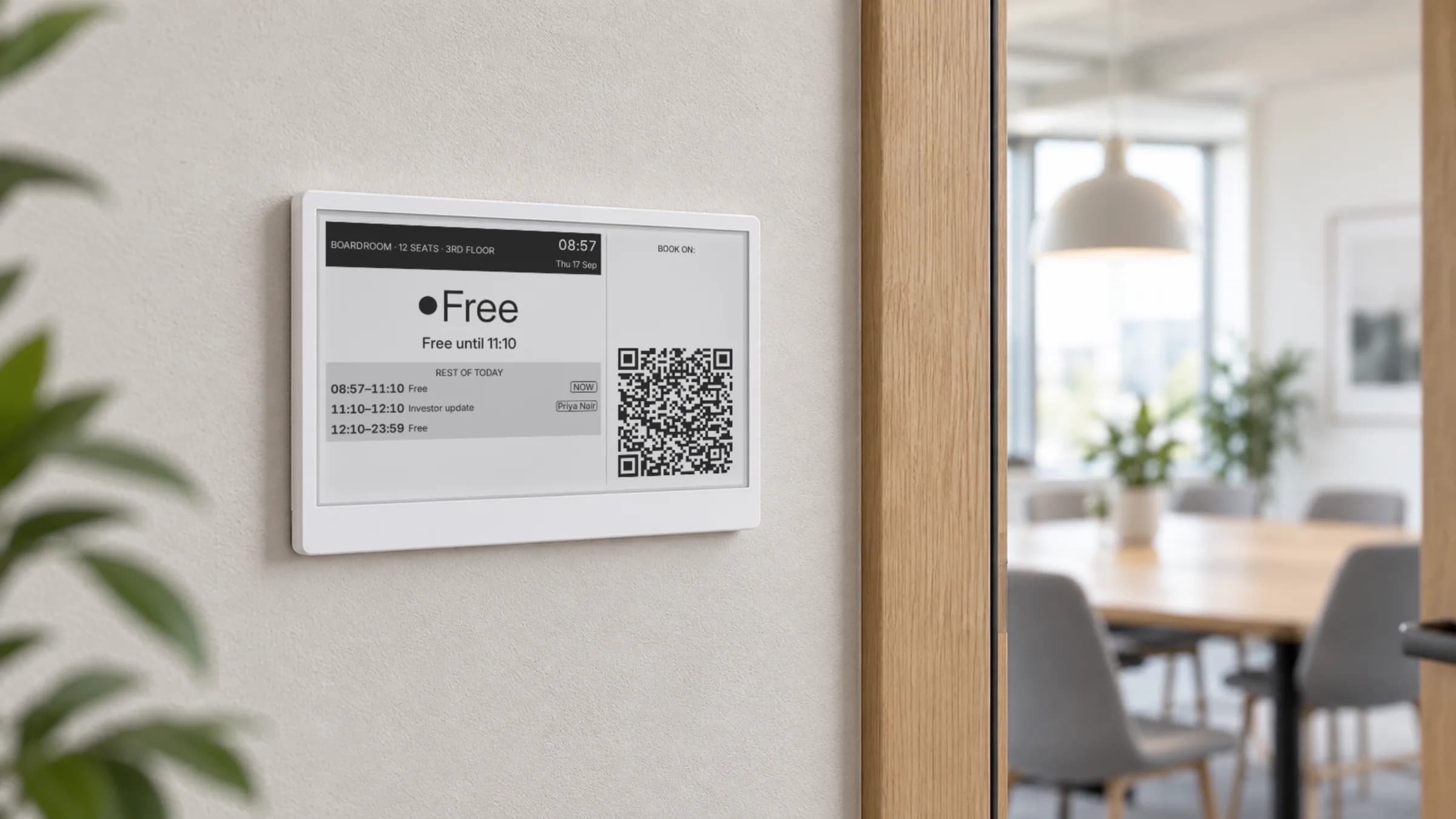 Seeed reTerminal E1001 e-ink display showing a Lobby room screen with the Boardroom available