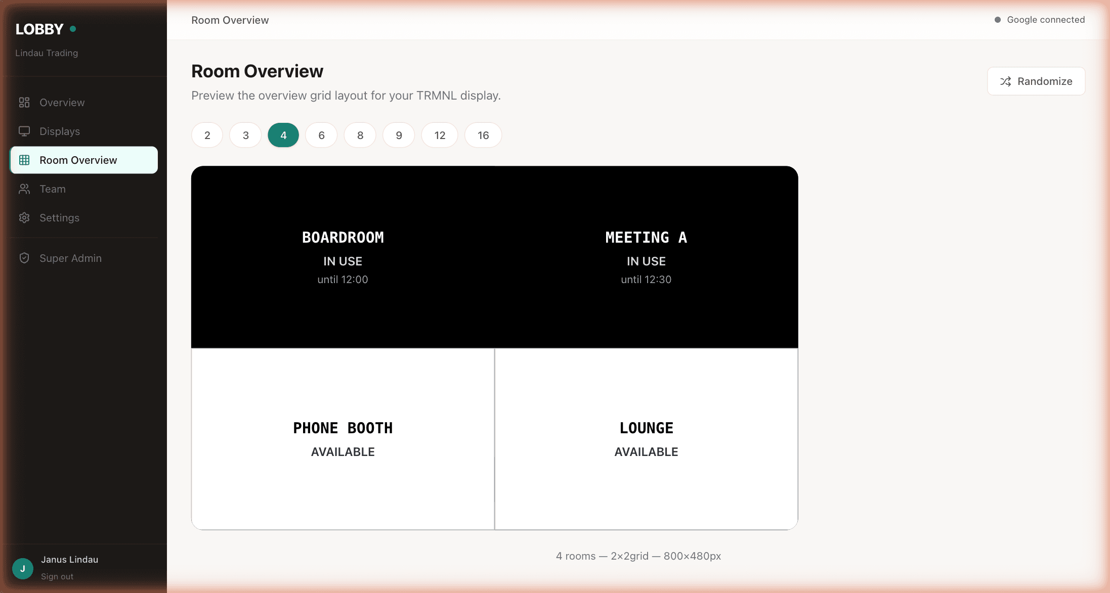 Room overview display with four rooms in a 2×2 grid — Boardroom and Meeting A in use, Phone Booth and Lounge available.