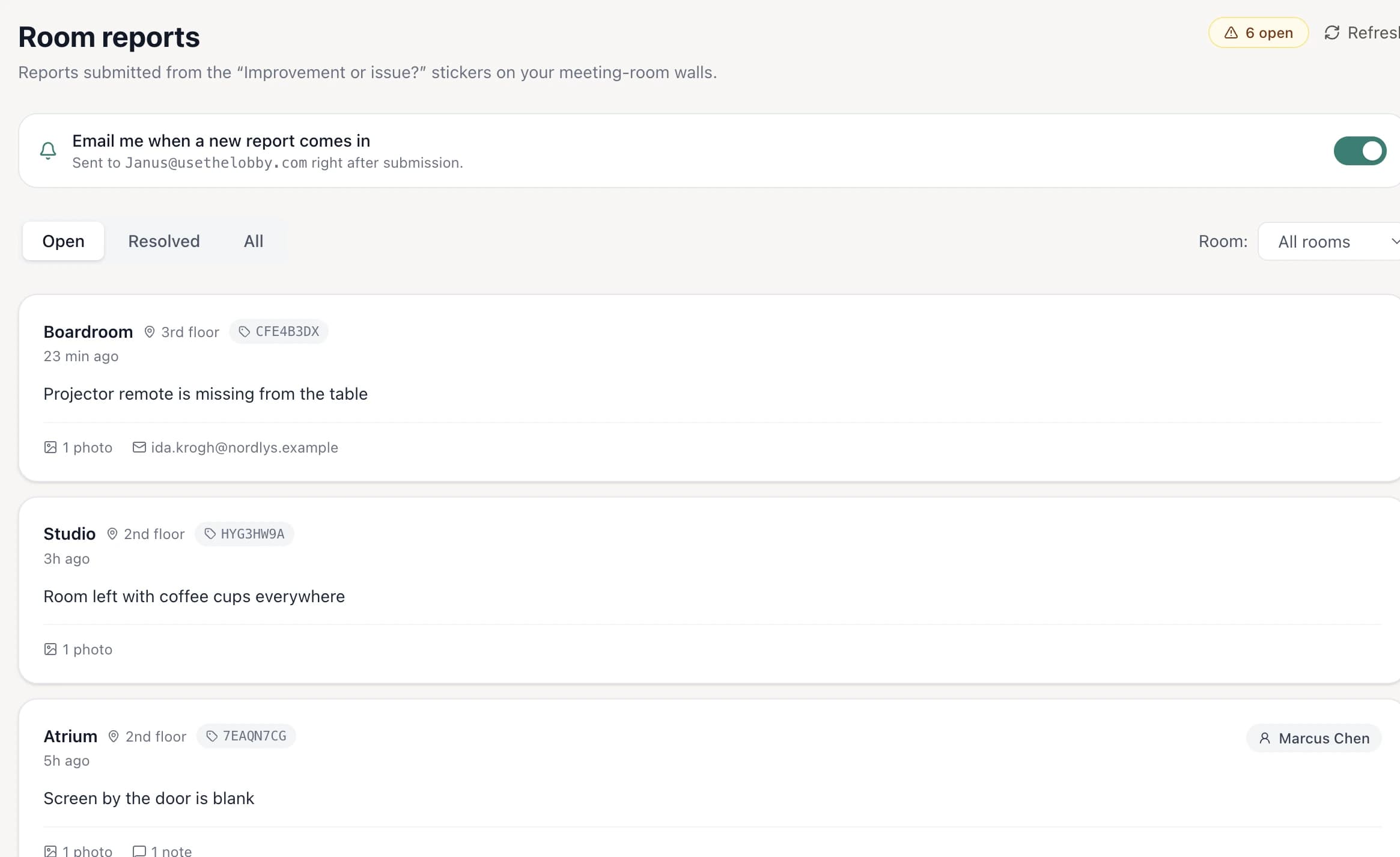 The Lobby room feedback inbox with open reports from several rooms, one expanded with a photo, an assignee and an internal note