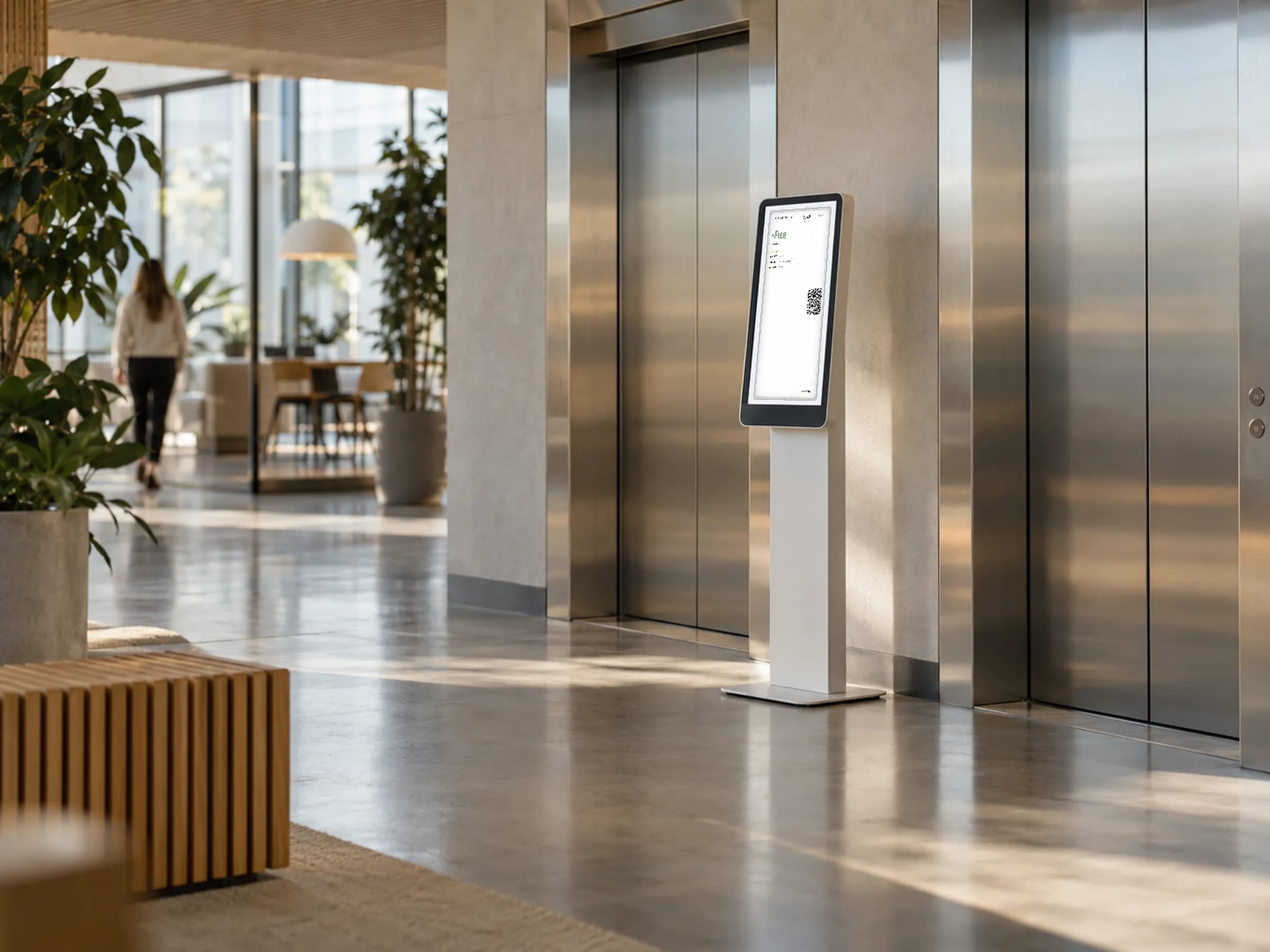 A touchscreen kiosk showing a Lobby virtual display of the Floor 2 board of meeting rooms