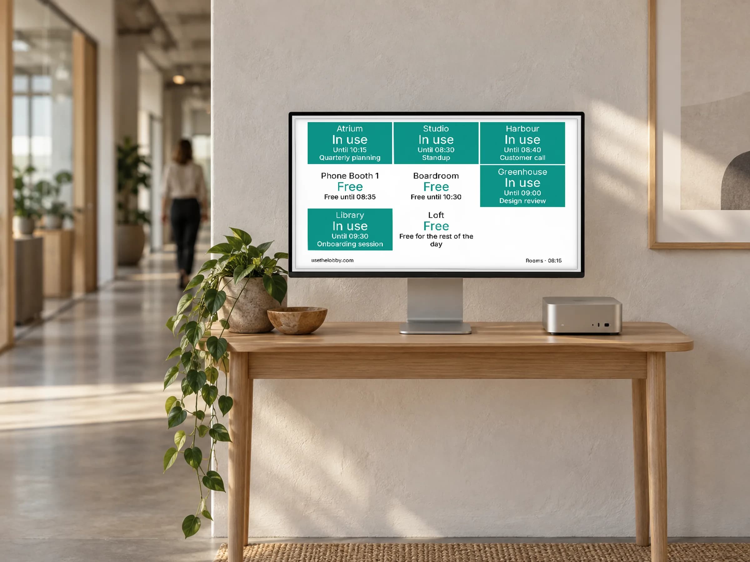 A spare monitor showing a Lobby virtual display of a kitchen board of meeting rooms
