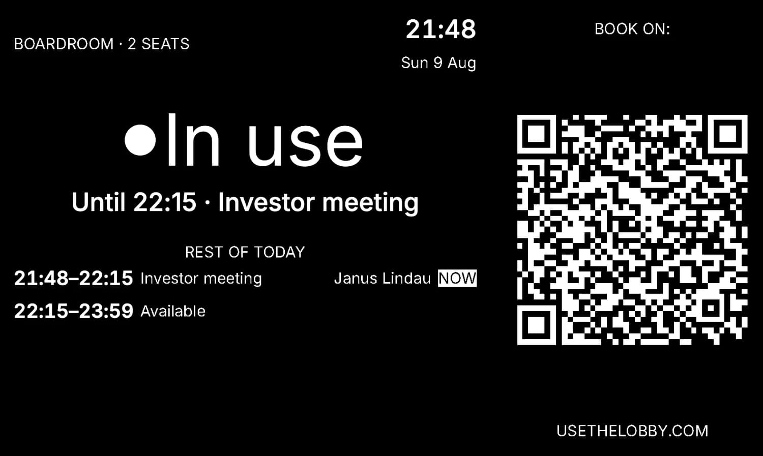 Meeting room display showing the Boardroom in use for an investor meeting until 22:15