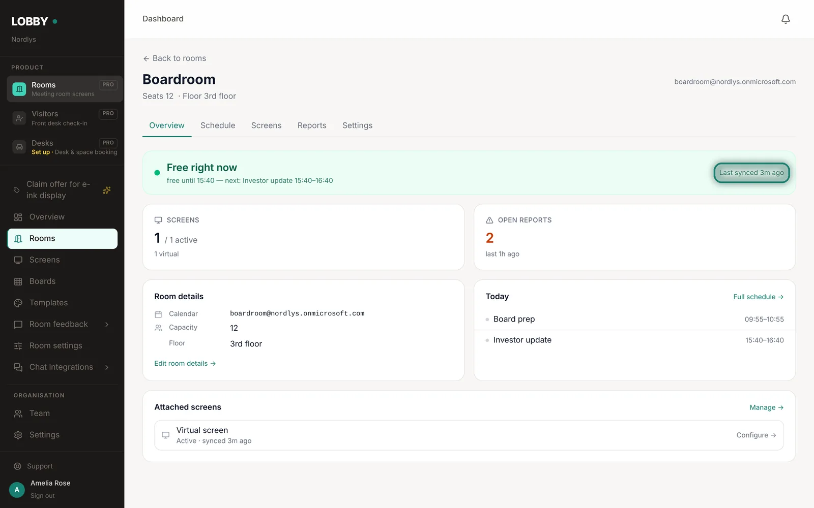A room's Overview tab shows its status, last sync and today's meetings.